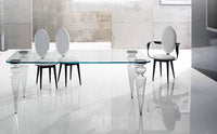dining table with designer dining chairs surrounding it