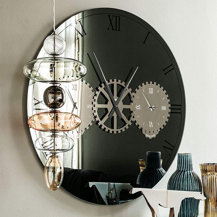Modern mirror wall clock designed by Cattelan Italia