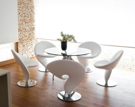 dining table surrounded by designer Italian dining chairs