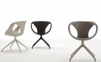 Three modern dining chairs made in Italy