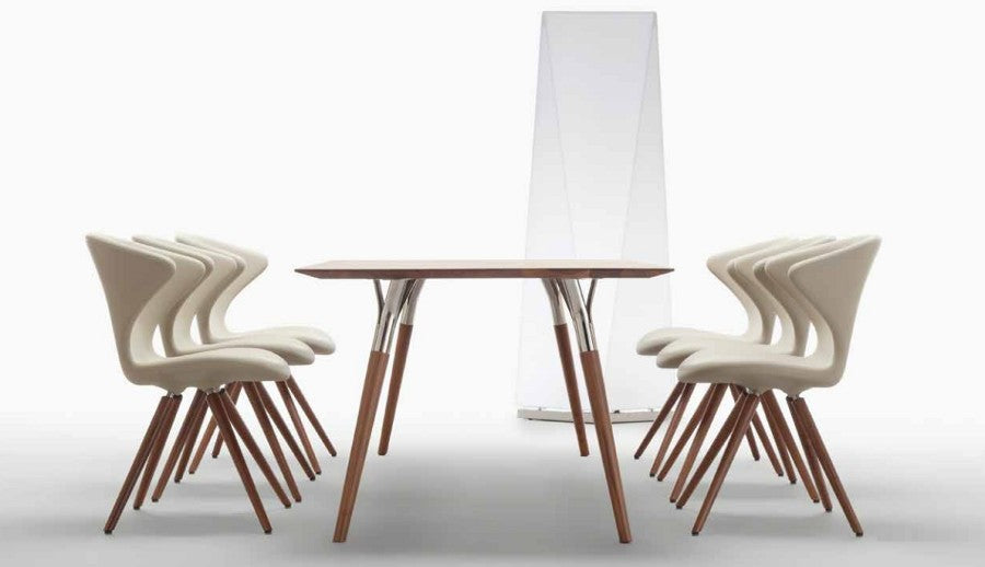 Italian dining table with white chairs
