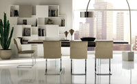 Ikon Drive Expandable Table side view with white chairs