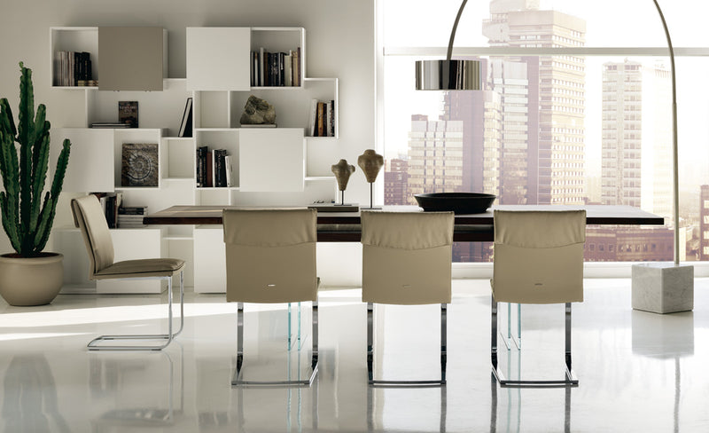 Ikon Drive Expandable Table side view with white chairs