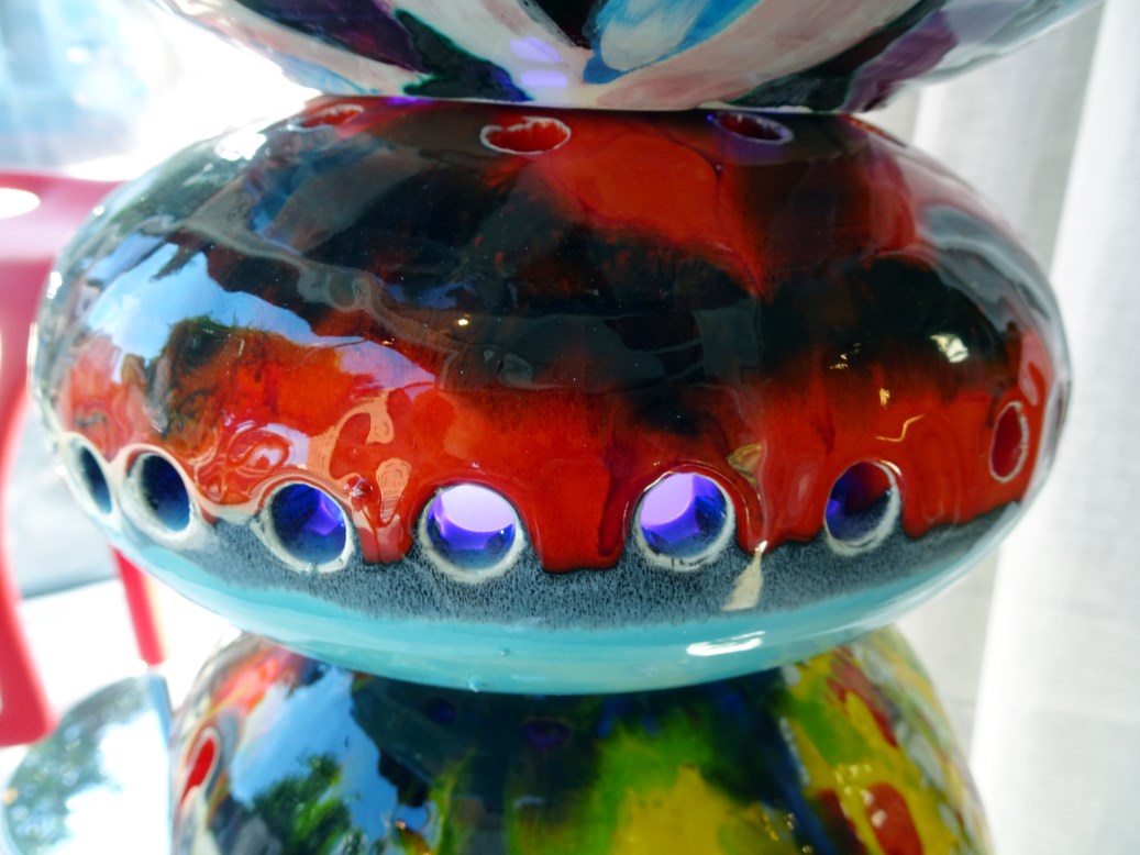 Close up view of hand painted ceramic spheres