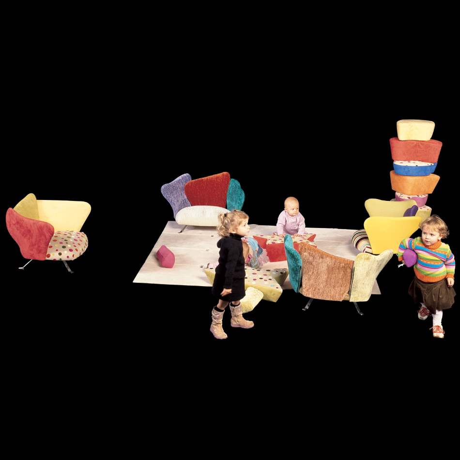 Italian children playing in room full of luxury baby furniture