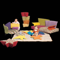 Italian children playing on designer children's funiture