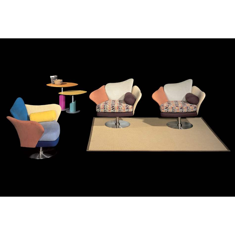 Staged room full of Italian furniture with black backdrop