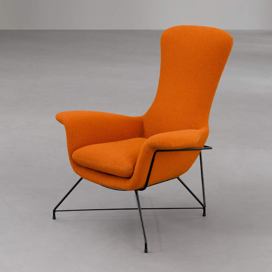 close view of orange sofa chair by Il Loft