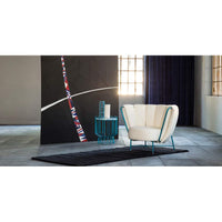 Modern Italian luxury chair by Il Loft with white cushions and metal frame