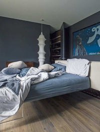 Italian bedroom with blue tones throughout the room