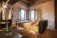 Contemporary Italian bedroom with floating air bed