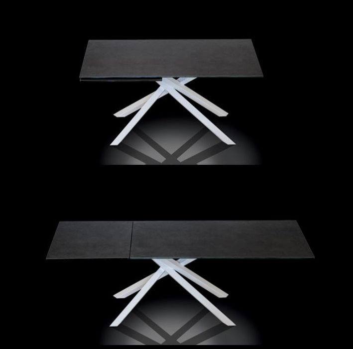 Boogie Expandable dining table by NAOS in small and expanded configurations