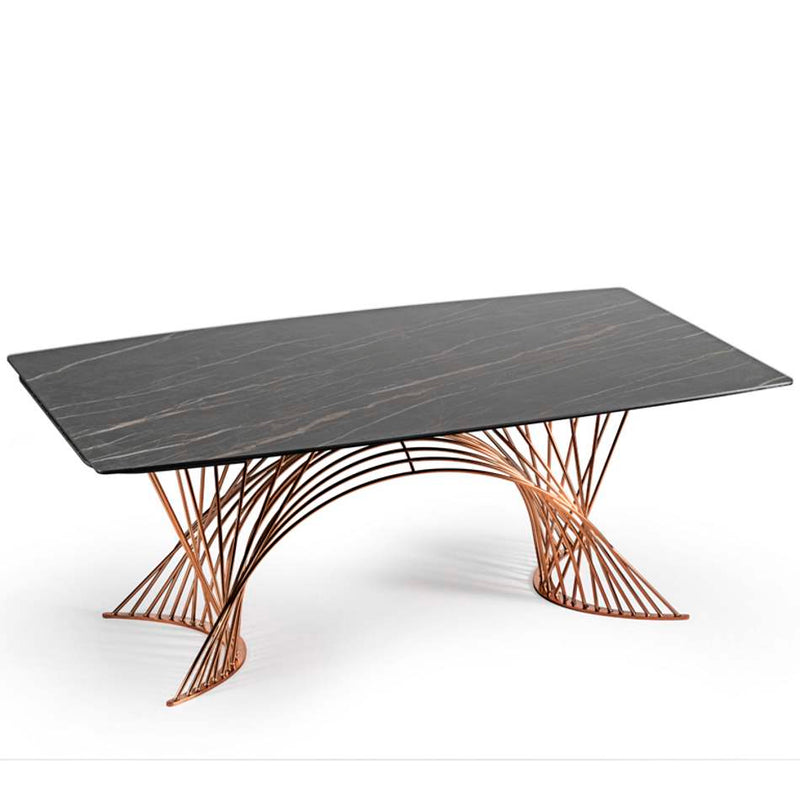 Expandable dining table with artistic base