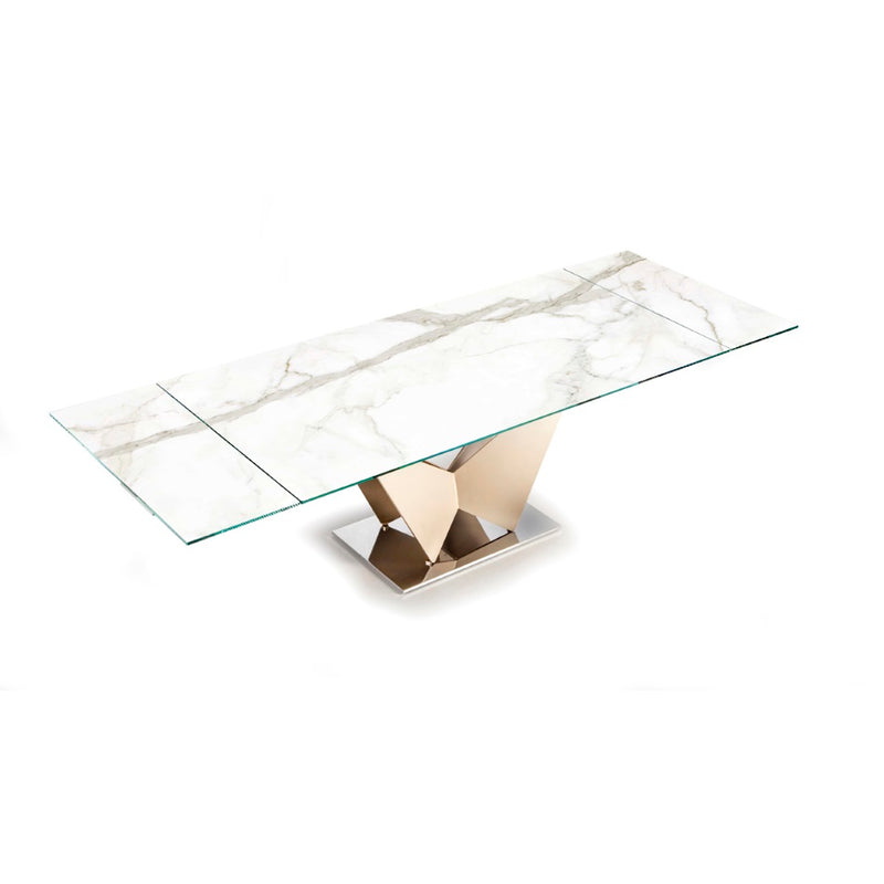 Expandable glass topped dining table in medium configuration