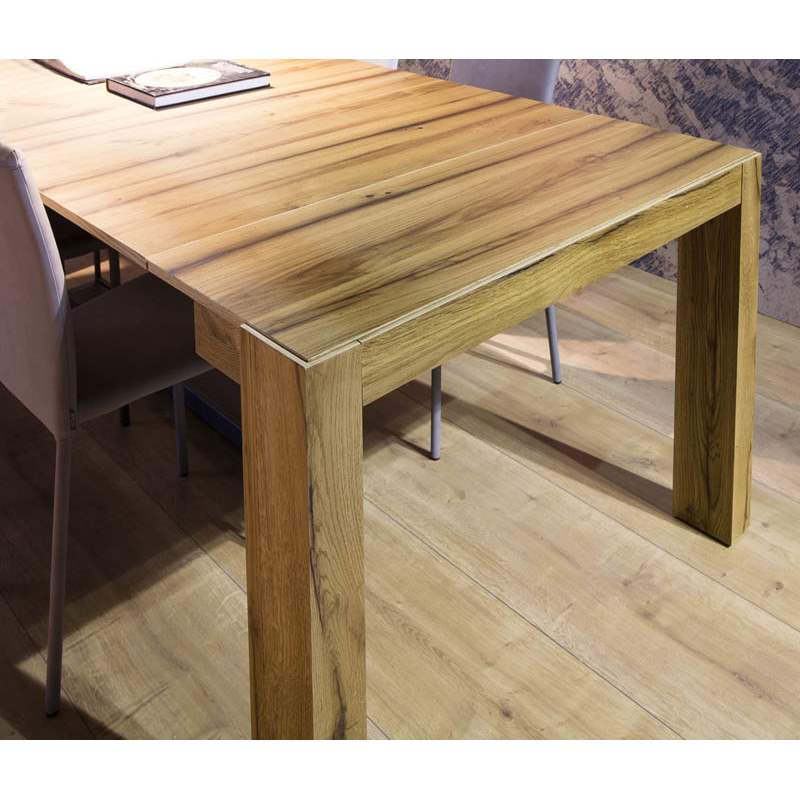 close view of the A 3 expandable tables wood grain
