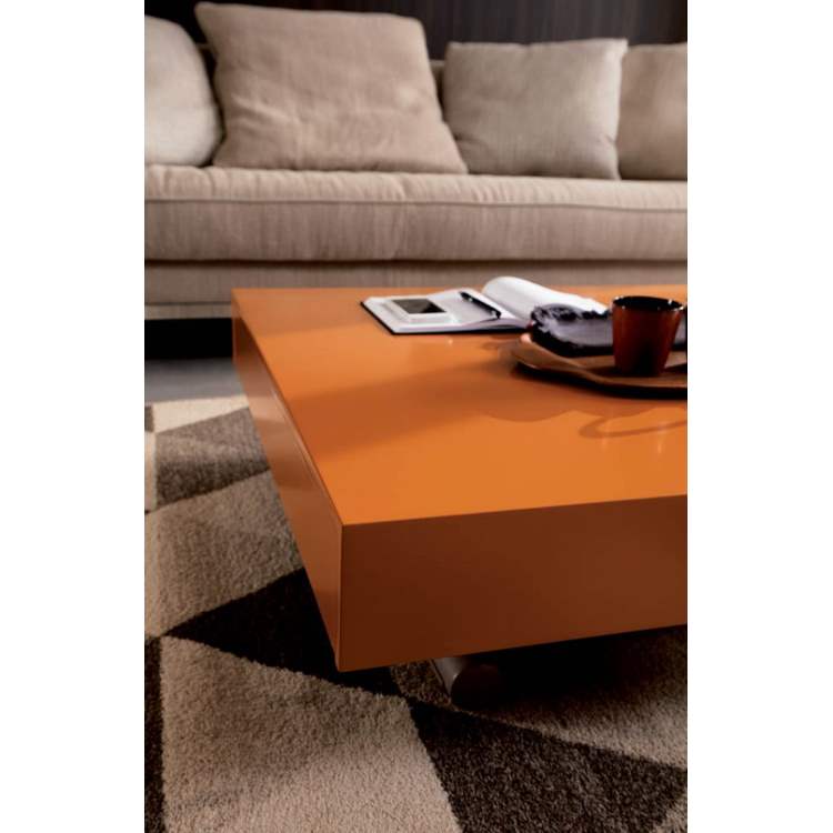 Expandable dining table configured as a coffee table