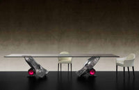 glass topped dining table by Reflex
