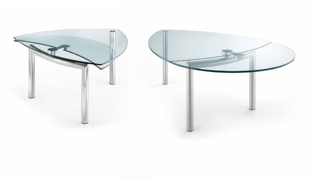 Two Policleto Goccia dining tables in expanded and un-expanded configurations