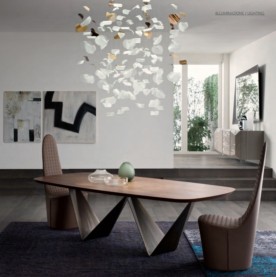 Italian dining room with glass chandelier by Reflex