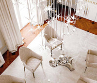 Room furnished with Italian furniture and lit by Stella Lampadario chandelier - italydesign.com