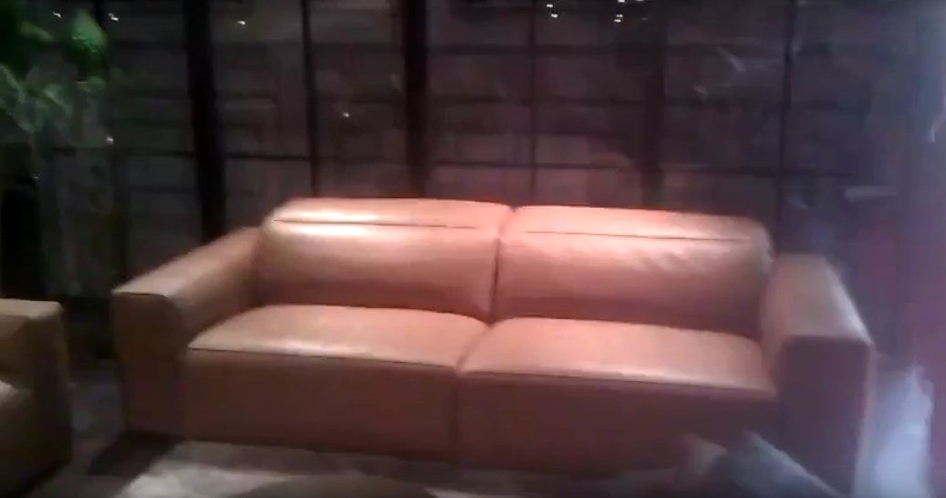 two seat tan leather sofa made in Italy by Ego Italiano