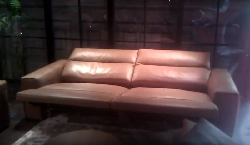 Italian sofa with both sections in reclined position
