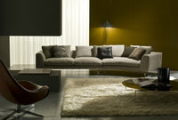 White leather sofa made in Italy displayed in a modern luxury living room