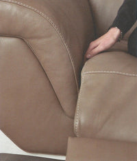 close up image of Italian brown leather sofa