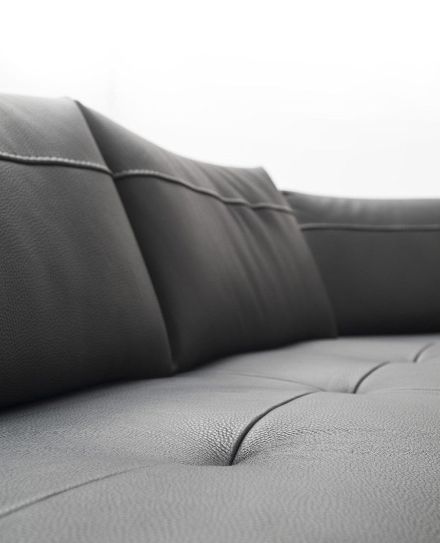 close view of black leather Italian sofa cushions