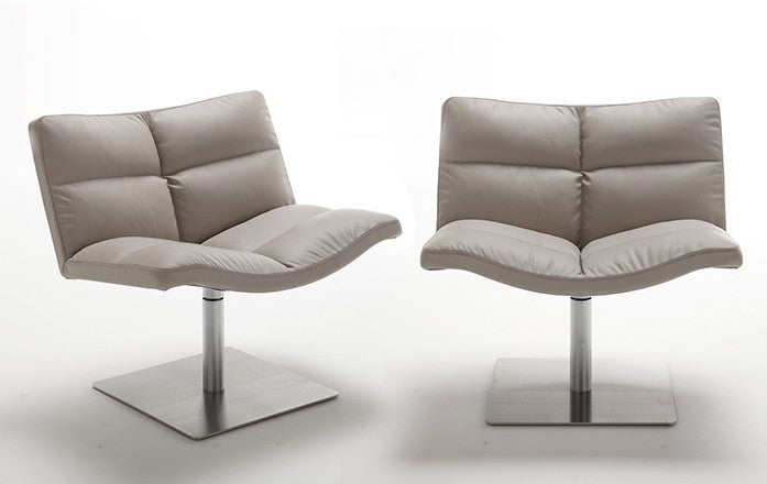 two designer Italian swivel chairs in grey leather