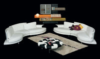 Super Roy Esc Sofa in a dark room furnished with Italian Furniture